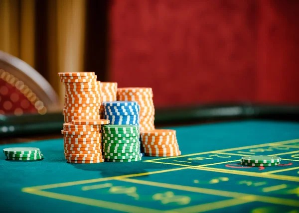 nada4d live-dealer studio showing professional gaming table, HD camera setup, and croupier managing a live session